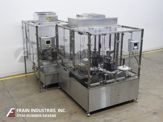 Intellitech Monoblock #AFSM1500, 2-up, automatic, continous motion, Stainless Steel, rotary filler, capper - Image 1