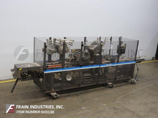 Scandia #725, automatic, expanded turret type over wrapping machine, 500200 CPM, AB PLC & AB Panelview 550 HMI - Image 1