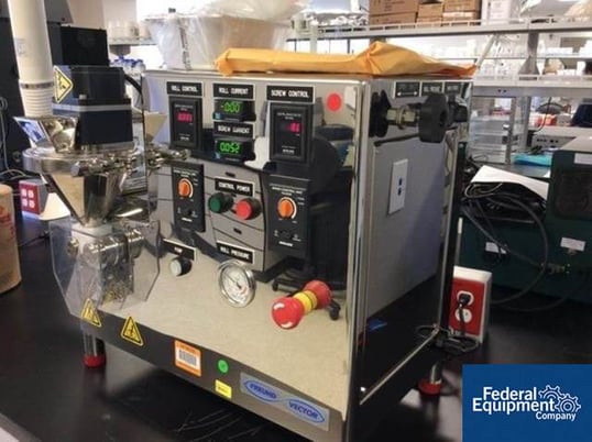 Freund Vector #TFC-LAB MICRO, roll compactor system, with digital roll Control, roll current & screw Control - Image 1