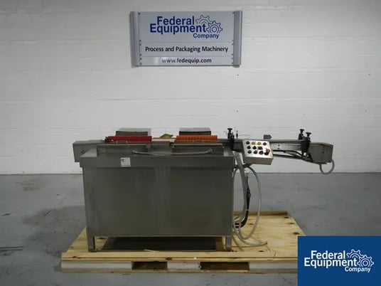 Vial Tray Loader, Calumatic, dual station, Stainless Steel base, pneu.oper.push mechanical, integ.mtd.slat - Image 1