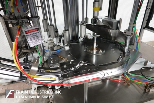 PMC #XRC-1200, 12 head, rotary, finger pump inserter and capper, 30-180 containers per minute, star wheel in - Image 2