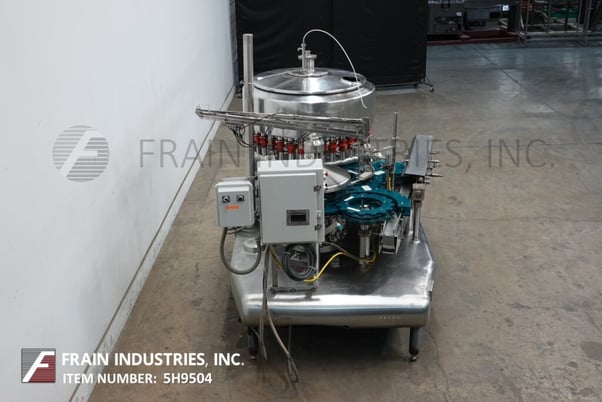 Federal #3612, automatic, Stainless Steel, 36 head rotary, pressure gravity filler & 12 head rotary capper - Image 3