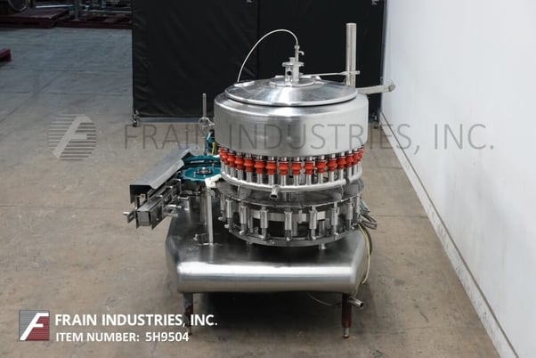 Federal #3612, automatic, Stainless Steel, 36 head rotary, pressure gravity filler & 12 head rotary capper - Image 4