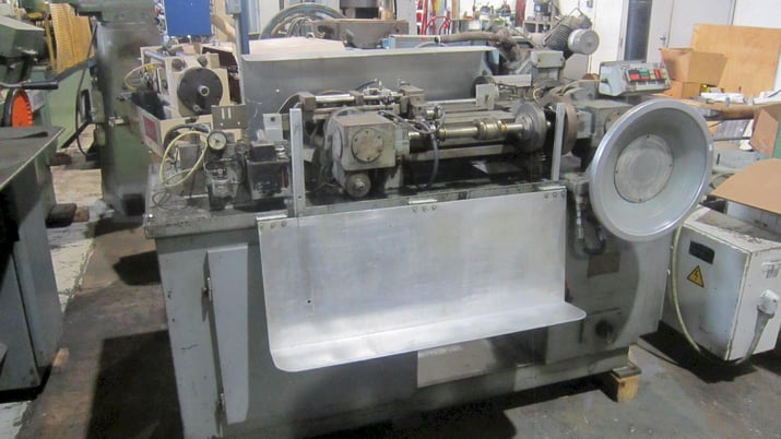 Baird #104, multi-slide, 1/32" thick, 7/8" strip width, 4-1/4" feed length, 110-550 PPM, 1.5 HP - Image 1