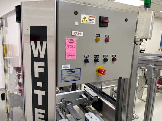 Wexxar #WFTE, automatic case erector, bottom taper, 5-15 cases per minute, mounted onm 4 leveling leg frame - Image 2