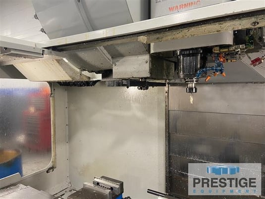 Haas #VF-4B, 50" X, Cat 40,10000 RPM, 30 HP, 40 side mount tool changer, chip auger, pre-wired 4th Axis - Image 3