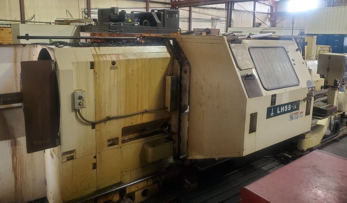 Okuma #LH55, CNC Lathe, 43.3" swing, 24" chuck, 12.9" bar, OSP E100L, chip conveyor, tailstock, 2005 - Image 5