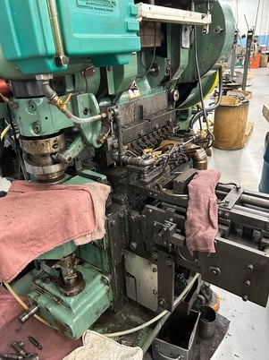 25 Ton, U.S. Baird #3-25, eyelet & transfer press, 2" stroke, 11 operation die set, Bijur Versa 3 automatic - Image 2