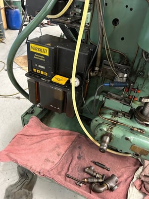 25 Ton, U.S. Baird #3-25, eyelet & transfer press, 2" stroke, 11 operation die set, Bijur Versa 3 automatic - Image 6