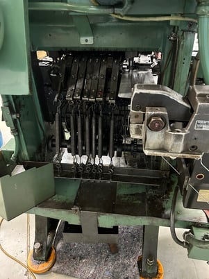 25 Ton, U.S. Baird #3-25, eyelet & transfer press, 2" stroke, 11 operation die set, Bijur Versa 3 automatic - Image 9