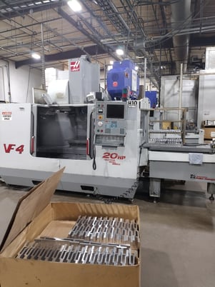 Haas #VF-4APC, 4-Axis CNC vertical machining center, 50" X, 20" Y, 25" Z, 10000 RPM, 24 side mount tool - Image 1