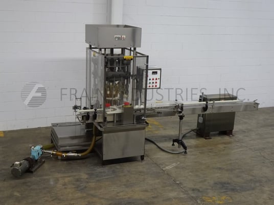 MRM Elgin #R50G-SF-18, automatic, 18 head, Stainless Steel rotary, fill to level pressure gravity filler - Image 1