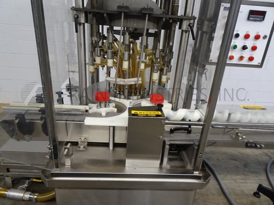 MRM Elgin #R50G-SF-18, automatic, 18 head, Stainless Steel rotary, fill to level pressure gravity filler - Image 2