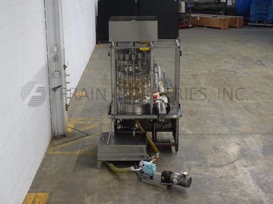 MRM Elgin #R50G-SF-18, automatic, 18 head, Stainless Steel rotary, fill to level pressure gravity filler - Image 3