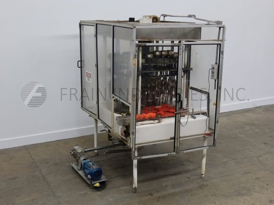 MRM Elgin, automatic, 30 head rotary pressure gravity filler, 40-300 containers per minute - Image 1