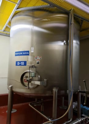 4000 gallon Walker, 316L Stainless Steel, single wall tank, 102" dia x 146" deep with a 108" straight wall - Image 1