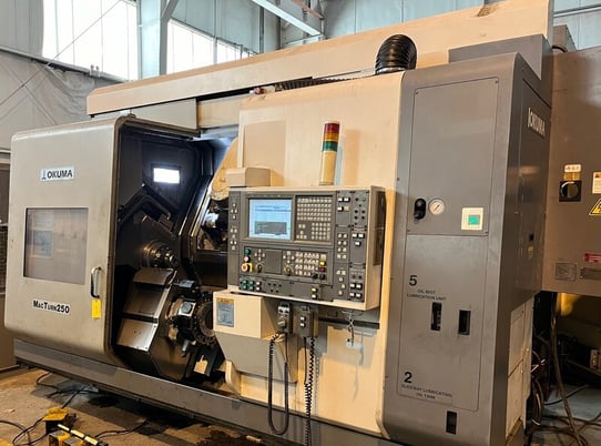 Okuma #MacTurn-250-2S/1000 Big Bore 5" Axis CNC turning center w/live milling, OSP-P100L Control, 2005 - Image 1