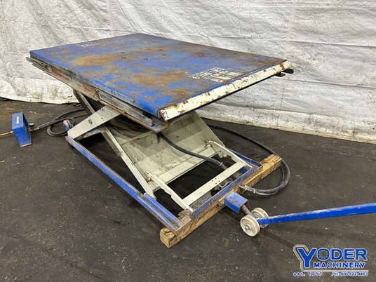 6000 lb. Chisum, air bag platform lift, 63" x 41" table, 36" raised height, pnematic foot pedal - Image 1