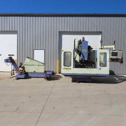 Takumi Seiki #V-11A, 3-Axis CNC vertical machining center w/4th-Axis 3PH & conveyor, 43.3" X, 21.6" Y, 25.5" - Image 1