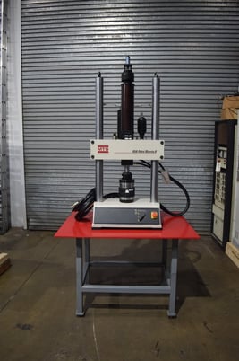 5.5 KIP (25kN), MTS #858 Mini Bionix II axial torsional fatigue load frame, 2 columns, 17-1/2" btwn columns - Image 1