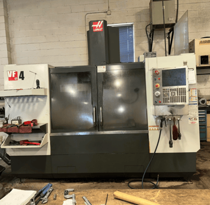 Haas #VF-4B, Vertical Machining Center, 50" X, 20" Y, 25" Z, 20 HP, 7500 RPM, 20 automatic tool changer, CAT - Image 1