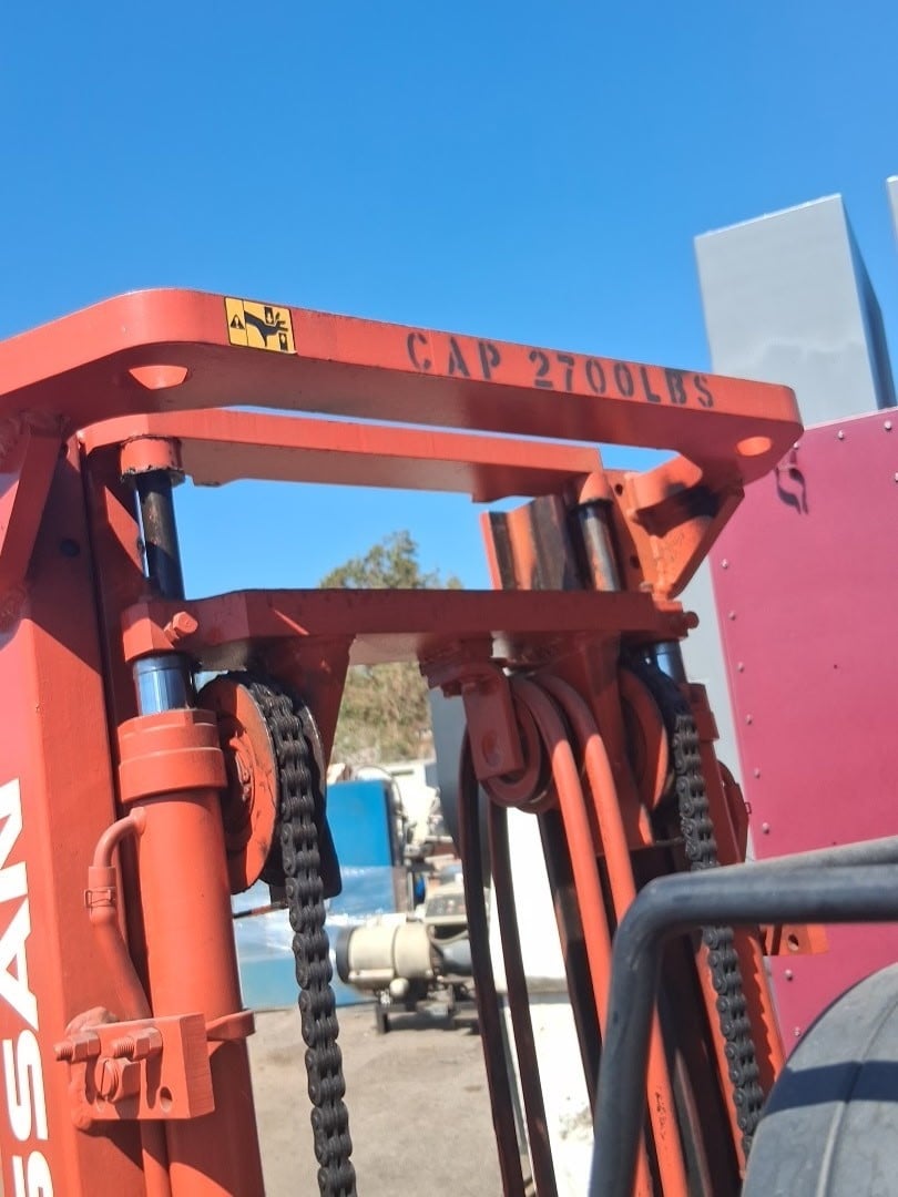 3000 lb. Nissan #CPH01A15PV, LPG-powered, 4-wheel sitdown forklift, cushion tire, 4-cylinder engine - Image 3