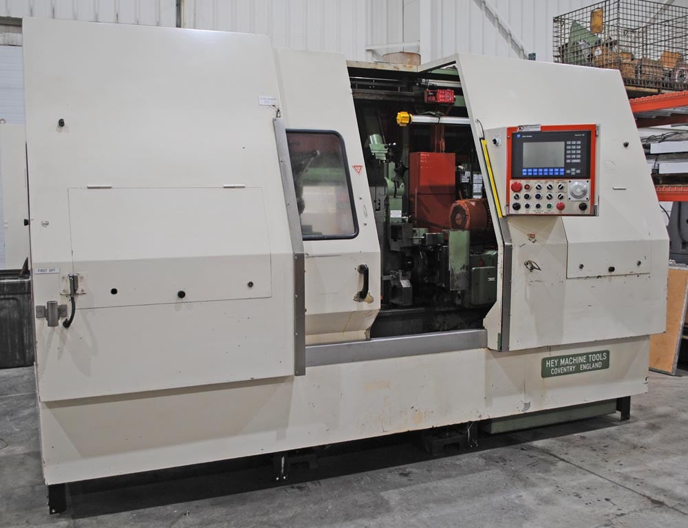 8" x 27" Hey #3, CNC facing & centering machine, 2-air vises, chip conveyor, AB Control, 1999 - Image 1