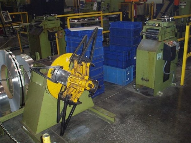2500 lb. Aida, non-motorized uncoiler, 12" width, 48" outside dimensions, 16"-20" ID, 6 keepers - Image 1