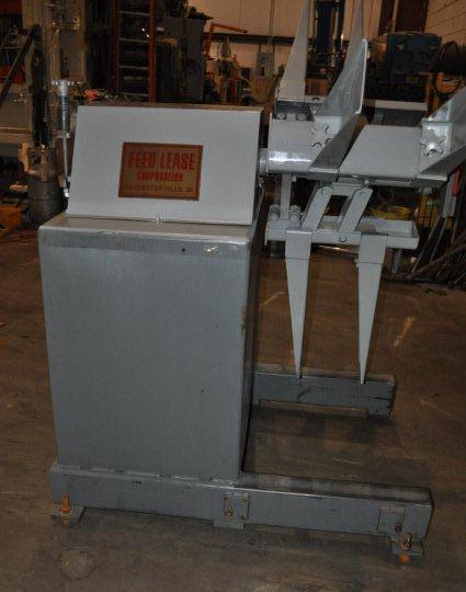 6000 lb. Feed-Lease #P46M-12, non-motorized uncoiler, 20" mandrel, 72" outside dimensions, 16"-20" ID, 1997 - Image 1