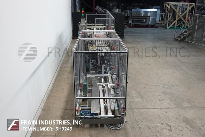 Hartness #825, automatic, intermittent motion, ascending, drop case packer rated from 10-30 cases per minute - Image 4