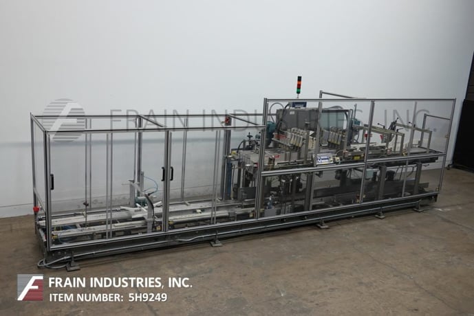 Hartness #825, automatic, intermittent motion, ascending, drop case packer rated from 10-30 cases per minute - Image 5