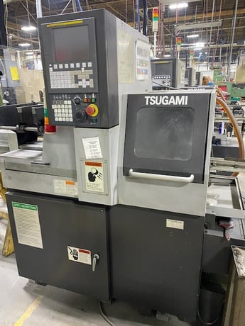 Tsugami #BO123, 3-Axis Swiss, 3-12mm, Fanuc 0i, part pusher from hooper for sawn parts to 10" length. (2) - Image 1
