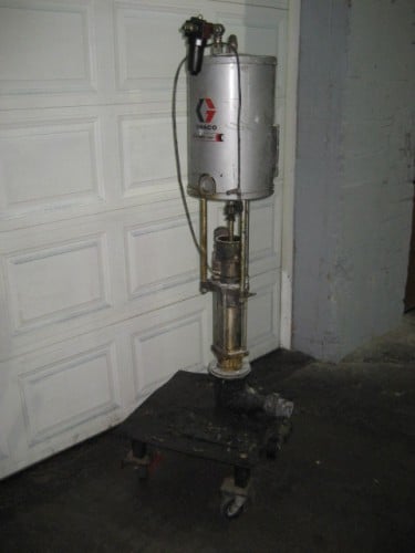 Graco #Bulldog, Piston Pump, stainless steel, 1.5" inlet, 2" outlet, Air operated, On cart with casters - Image 1