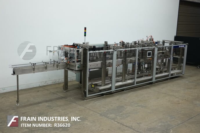Hartness #875, automatic intermittent motion Stainless Steel case packer, up to 35 cycles per minute, mounted - Image 1