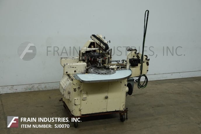 Rasch #RU, semi automatic, intermittent motion, bottom fold, foil wrapping machine, mounted on base frame - Image 1