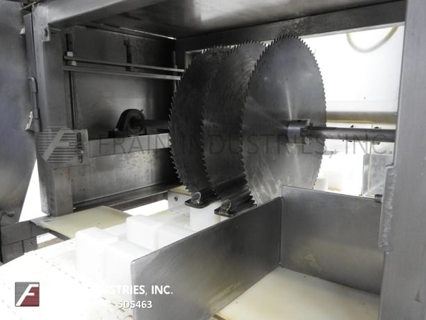 Multi-slicer with (3) 12" blades slicing product in segments - Image 2