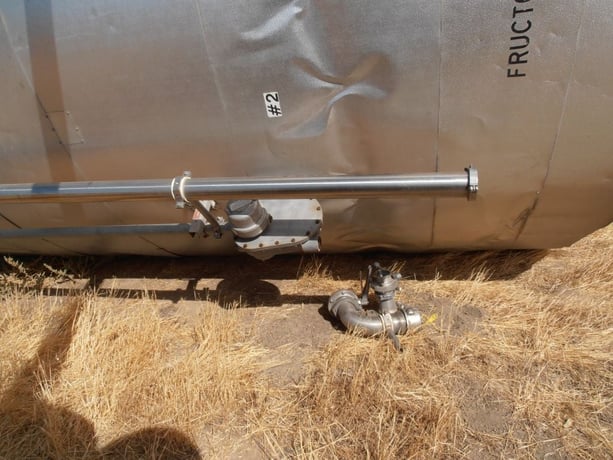 6000 gallon Carbon Steel Storage Tank, Epoxy, Jkt, 9'10" diameter x 12' high, 3" diameter side bottom outlet - Image 5