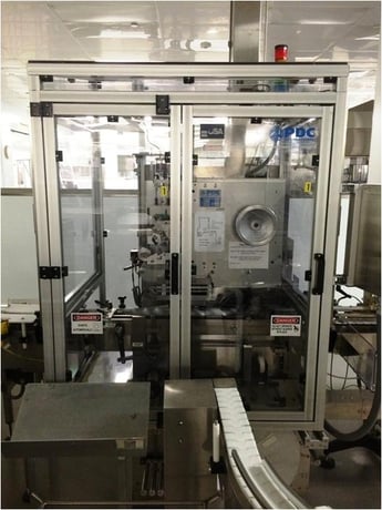 PDC #75-E, capper neck banner, automatic, Stainless Steel, continuous motion, shrink neck bander & sleever - Image 1