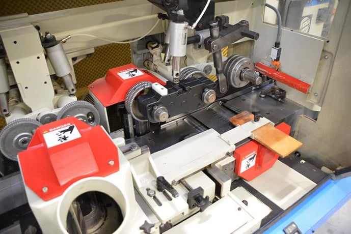 Weinig #U-23E, feed through moulder, 6-heads, 9-1/16" x 4-3/4" capacity, 1-9/16" spindle, variable speed, 2005 - Image 9