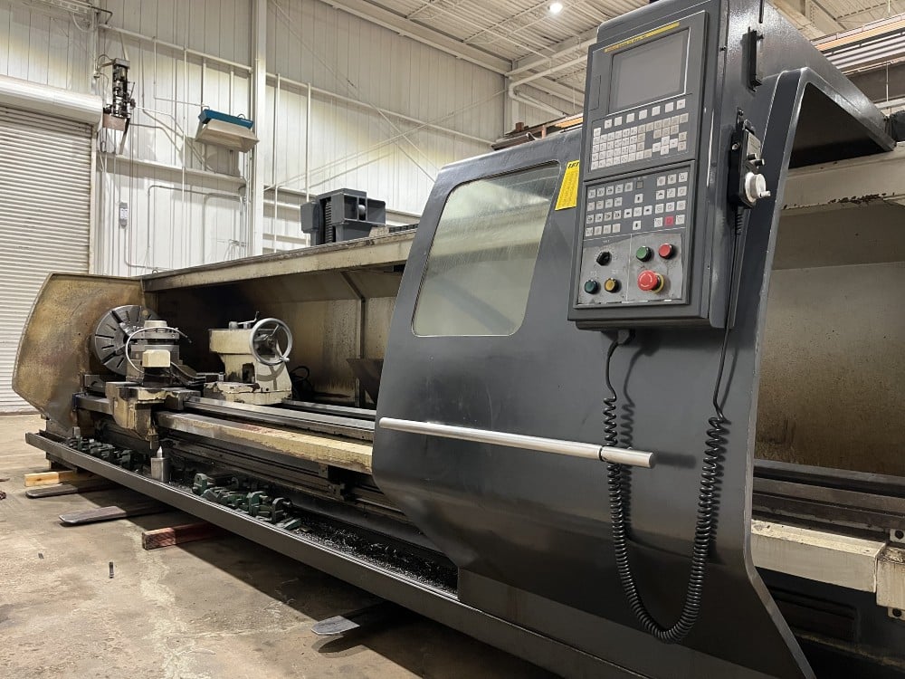 Vanguard #CAK80485D, 2-Axis flat bed CNC lathe, Fanuc Oi Mate, 4-jaw 25" chuck, 32" swing, 191" centers, 4.1" - Image 1