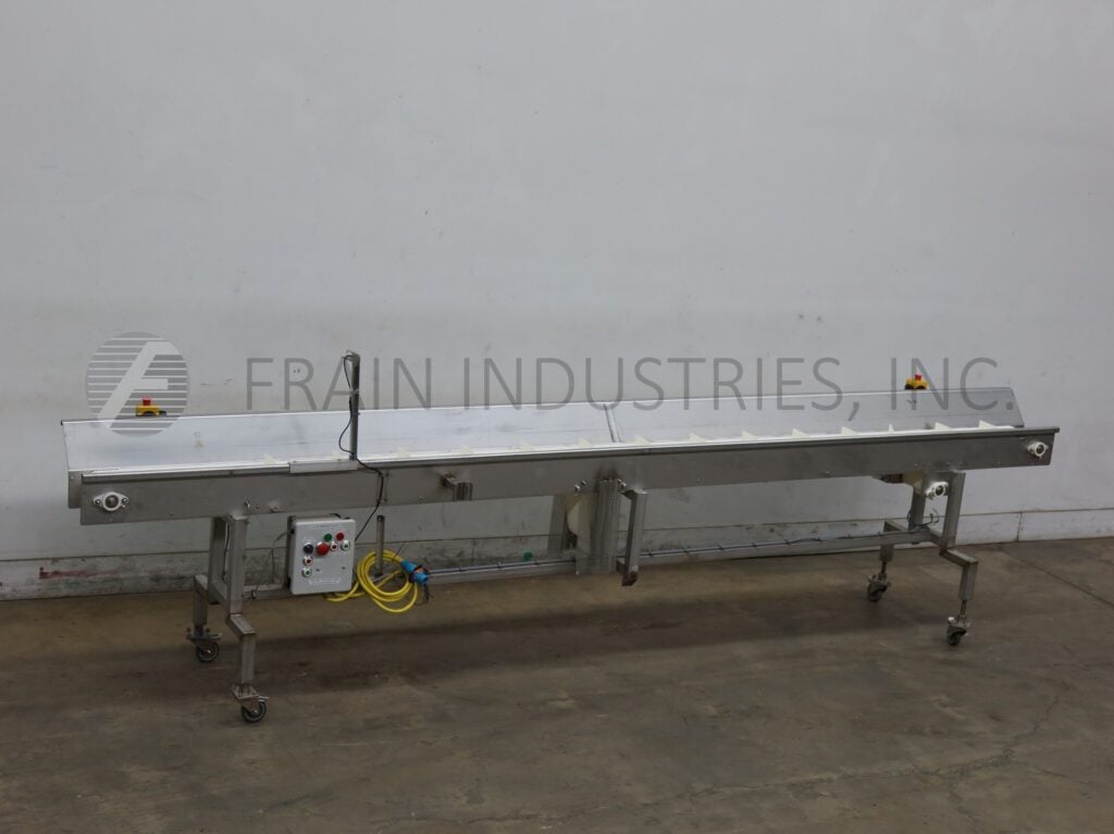 7-1/2" wide x 15.3' long, Stainless Steel table top conveyor, mounted on frame with locking casters - Image 1