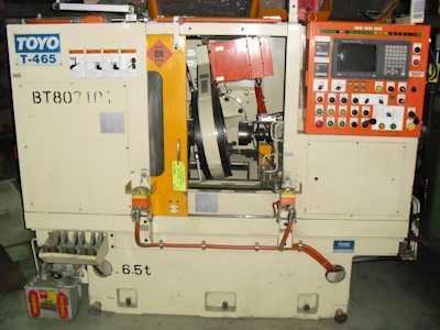 Toyo #T-465, 5-Axis Fanuc 160M CNC Control, power stock, 400mm honing wheel, coolant system, 2001 - Image 1