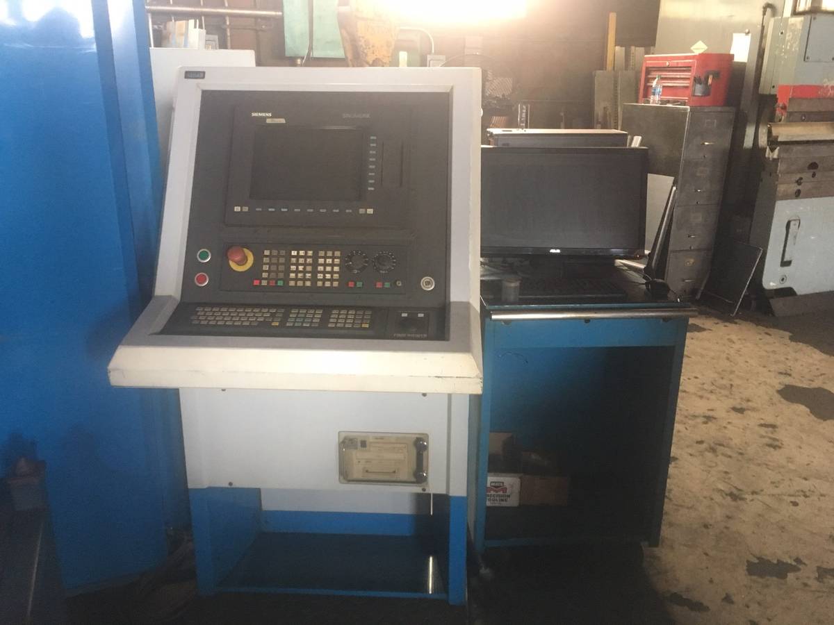 33 Ton, Finn-Power, CNC Turret Punch, 8'-3" x 4'-2" sheet, 312" material thickness, 3.50" tool diameter - Image 2