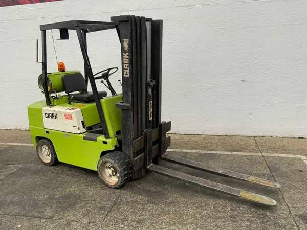 5500 lb. Clark #C500-55, LP gas forklift, 244" lift height, protective roll cage, automatic transmission - Image 1