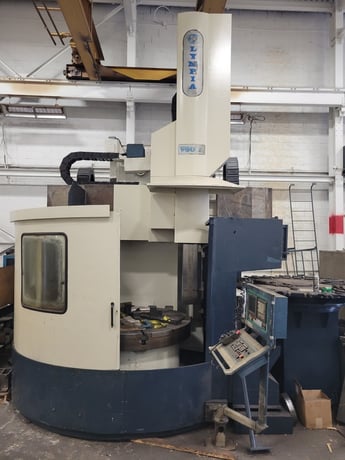 68" Olympia #V60L, CNC vertical turret lathe, Fanuc 180i-T, 30 ATC, Movable column, 66" table, 1999 - Image 1