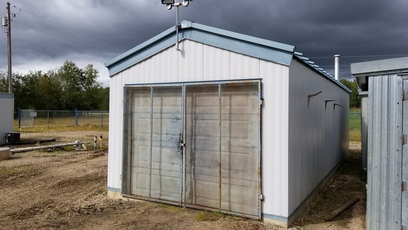 32' Kearney & Trecker Metal Industries, steel/concrete storage building, assembled on concrete pad, 2002 - Image 2