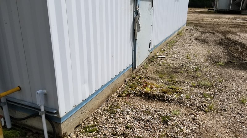 32' Kearney & Trecker Metal Industries, steel/concrete storage building, assembled on concrete pad, 2002 - Image 5