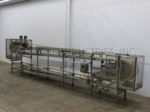 Alliance Inc Corp., inverted gripper rinser bottle cleaner, 1000 bottles per minute - Image 1