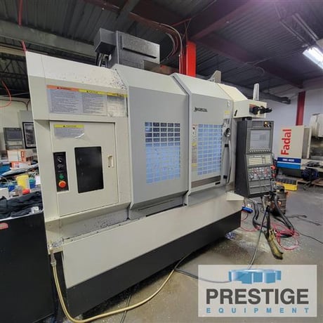 Okuma #Genos-M560-V, 41" X, 22" Y, OSP-300M, 32 automatic tool changer, part/tool probe, 4th Axis table, Chip - Image 1