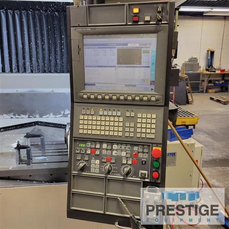 Okuma #Genos-M560-V, 41" X, 22" Y, OSP-300M, 32 automatic tool changer, part/tool probe, 4th Axis table, Chip - Image 4